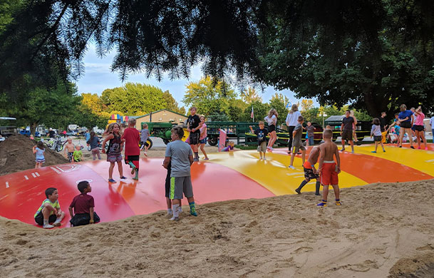 kids bouncing on the jumping pillow at Adventure Bound Beaver Trails