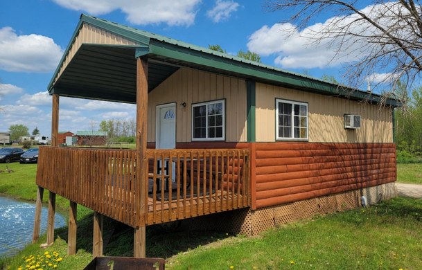 wheelchair accessible family cabin rental exterior with ramp at Adventure Bound Beaver Trails