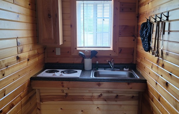 accessible family cabin kitchen with stove at Adventure Bound Beaver Trails